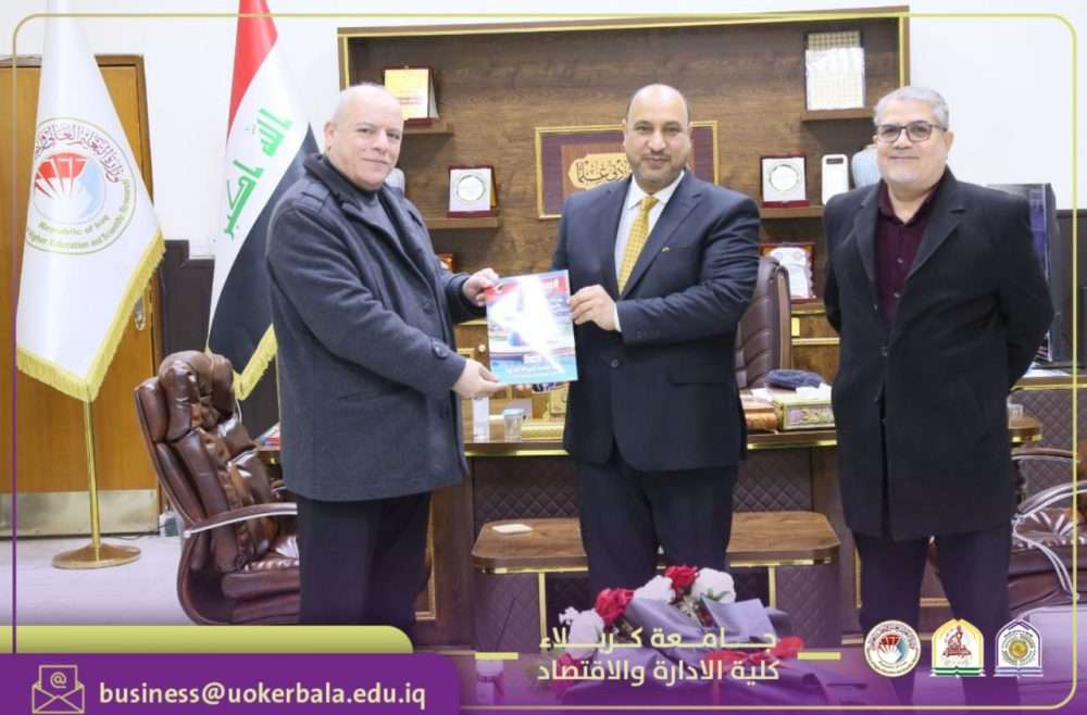 Dean of the College of Administration and Economics at the University of Karbala Receives a Copy of "Al-Mustashar" Magazine as a Gift for the College Library