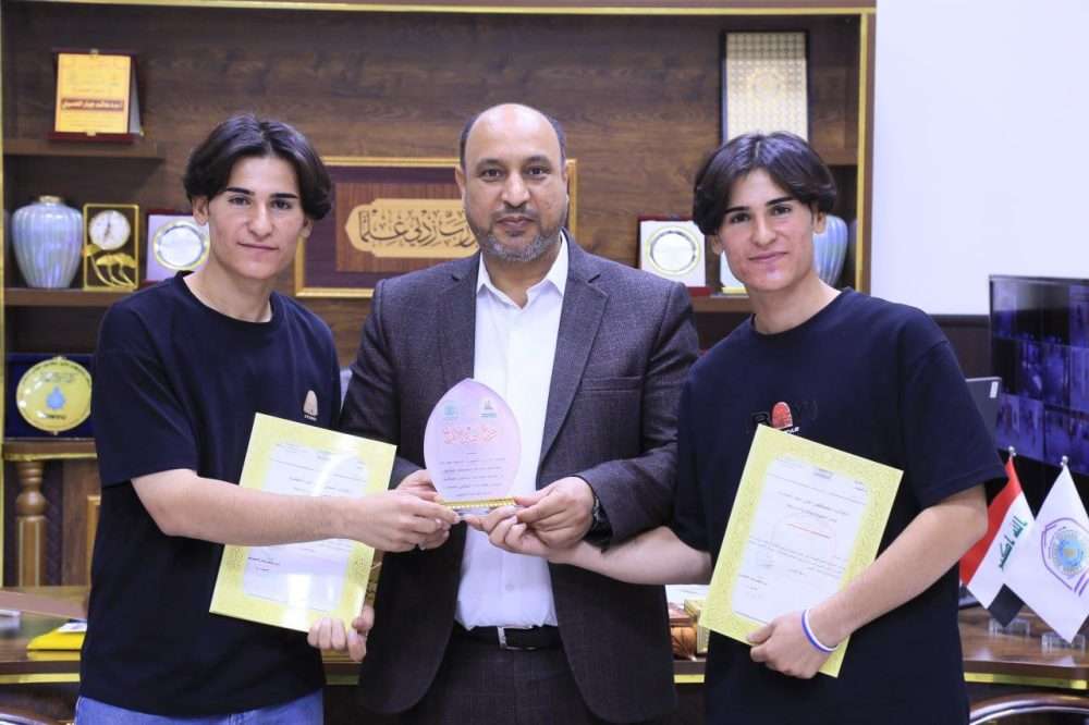 You are currently viewing The Dean of the College of Administration and Economics at the University of Karbala Honors Two Students for Producing a Promotional Video